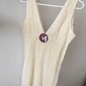 Never worn short dress, runs likes a medium.